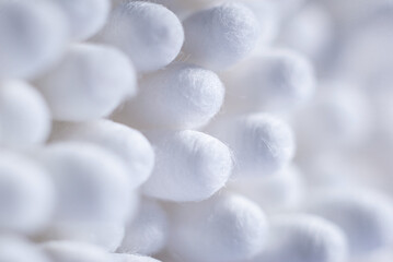 macro shot of the heads of white cotton swabs