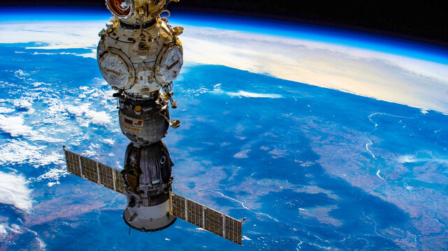 Soyuz spacecraft and planet Earth. Digital Enhancement. Elements by Nasa 