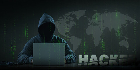 Dangerous anonymous hackers are using laptops for identity theft. with the font''HACKER''cyber...