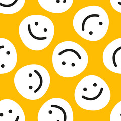Yellow seamless pattern with white happy faces.