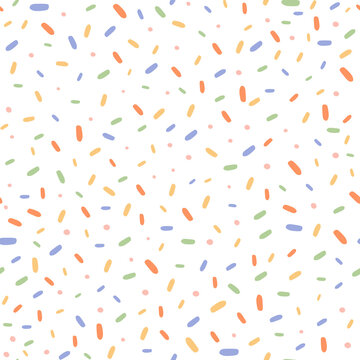 Colorful cake sprinkles seamless pattern with white background.
