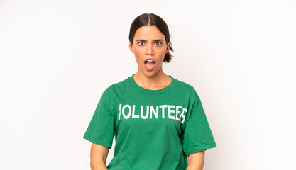 pretty hispanic woman looking very shocked or surprised. ecology and volunteer concept
