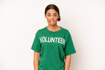 pretty hispanic woman looking puzzled and confused. ecology and volunteer concept