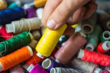 spools of thread and needle