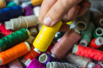 spools of thread and needle