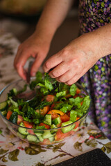 person cutting vegetables