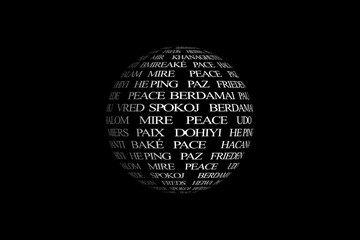 Esfera formada por la palabra paz con texto blanco en varios idiomas sobre fondo negro