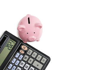 Calculator and piggy bank white background.Concept family budget and business.