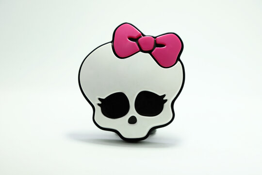 Monster High. TV serie and movies. Logo. Skull with pink bow. ID. Brand. Monster Academy.