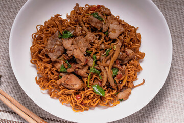 Spicy Stir Fried Instant Noodle with Pork and basil (Pad Kee Mao)