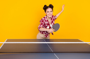 Photo of adorable cute lady trainer show how practice ping pong game use racquet ball isolated...