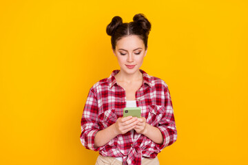 Photo of millennial lady use gadget read network influencer post wear plaid outfit isolated bright color background