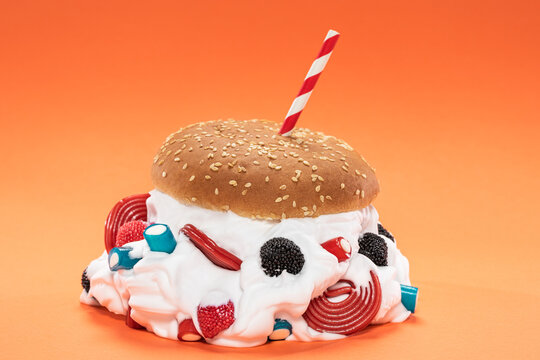 Burger with whipped cream and gummies