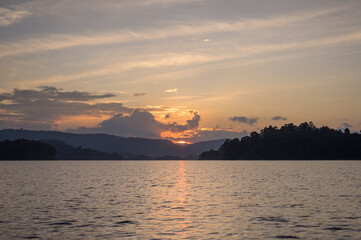Beautiful colorful sunset at Lake Bunyonyi, cloudy sky