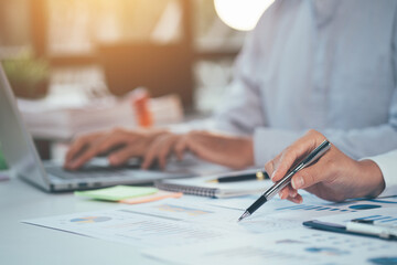 Group of business people brainstorming, analyzing and planning to work together at the meeting