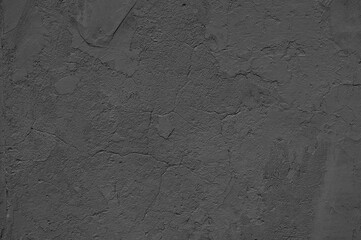 gray background. in the photo, an old gray concrete wall in close-up.