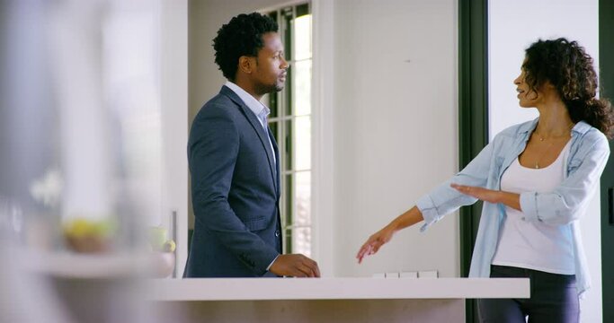 Upset, angry and mad wife fighting and arguing with husband at home. Sad husband and wife break up because of cheating and divorce after having marriage or relationship problems