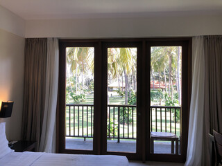 Cottage with coconut tree garden view