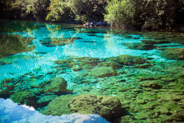 Fototapeta na wymiar Cornino Lake near Udine Italy is a Cristal Clear Blue Colour Lake near Gemona Del Friuli and it is in a protected natural area.