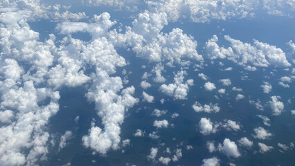 The natal background of the sky with clouds. Top view