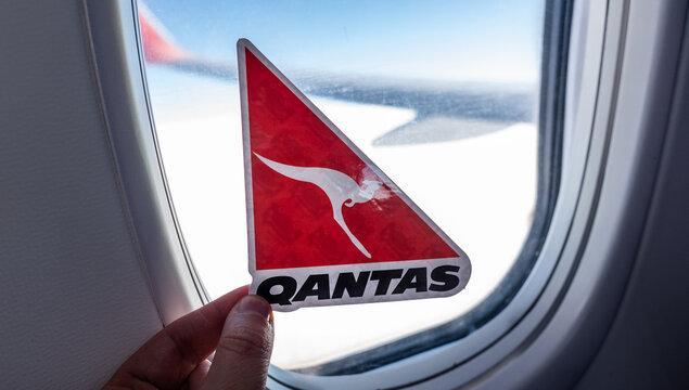 December 6, 2021, Sydney, Australia. The emblem of Qantas airlines on the background of the aircraft porthole.