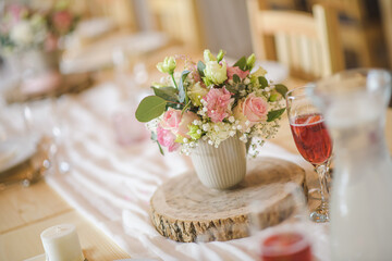 wedding table with flowers and decorations, wedding centerpiece or event reception. 