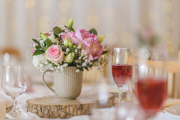 wedding table with flowers and decorations, wedding centerpiece or event reception. 