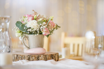 wedding table with flowers and decorations, wedding centerpiece or event reception. 