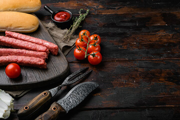Ingredients for different homemade Hot Dogs, on old dark  wooden table background, with copy space for text