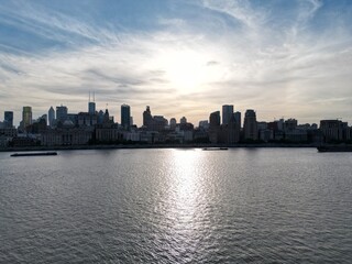Naklejka premium Sunset over the Bund in Shanghai - a view from the Lujiazui side of Pudong - photo taken with my drone at 25 meter altitude over the river