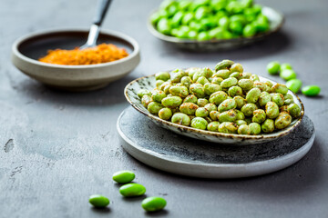Roasted edamame beans as snack with spices