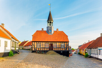 Former Town Hall of Ebeltoft, Jutland, Denmark around sunset. It was built in 1789 and is now in...