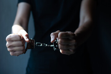 prisoner concept, Handcuffed hands of a prisoner in prison, Male prisoners were severely strained...