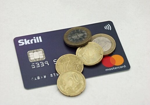 Modern Skrill Mastercard and Euro coins