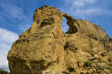 Koltso Mountain is a stone rock with a hole in Kislovodsk Russia on a clear summer sunny day