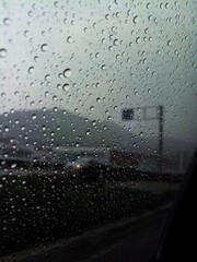 Raindrops on the window of a car