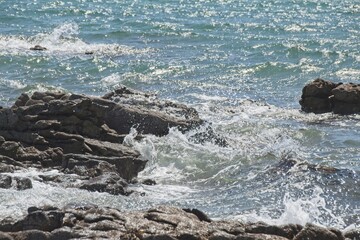 waves crashing on rocks