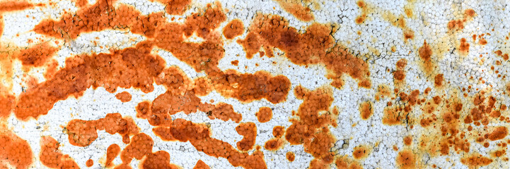 Rust stains on white foam sheet wall