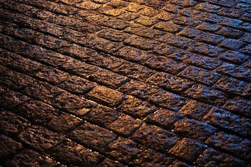 Close-up shot of old cobblestone road,brick road