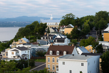 Aerial east view of part of the old town seen during a late summer afternoon, with the St. Lawrence...