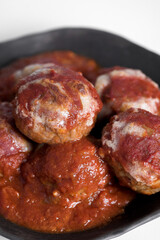 details of meatballs in tomato sauce