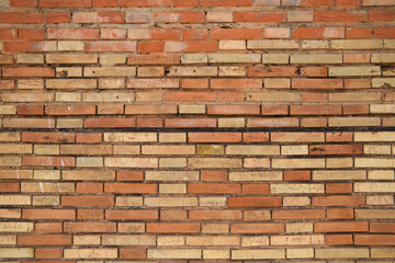 Old brick wall with shadow texture can be used as background.