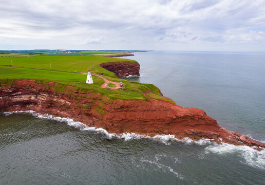 Lighthouse on the red sand cliffs