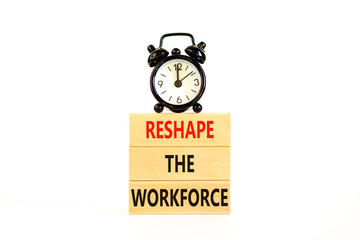 Reshape the workforce and support symbol. Concept words Reshape the workforce on blocks. Black alarm clock. Beautiful white table white background. Business reshape the workforce concept. Copy space