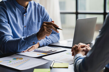 Business people meeting business consulting brainstorming project analysis report Check investment results And profits of the company