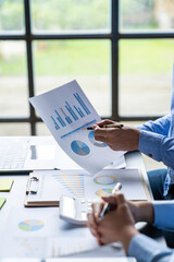 Business team meeting present. secretary presents the new idea and makes a report to professional investors with the new finance project plan during discussion at meeting.