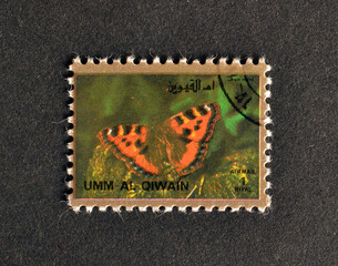 Umm al-Qiwain - circa 1972 : Cancelled postage stamp printed by Umm al-Qiwain, that shows...