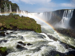 Landscape of Iguazu waterfalls with rainbow