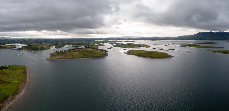 panorama landscape of Rosmoney Pier and marina and the drumlin islands of Clew Bay