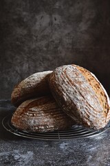 Homemade sourdough bread on the wooden background
